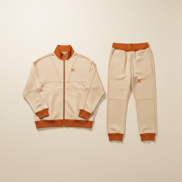 Grid Stitch Original: zip-up jacket with stand collar and trousers, laid flat.