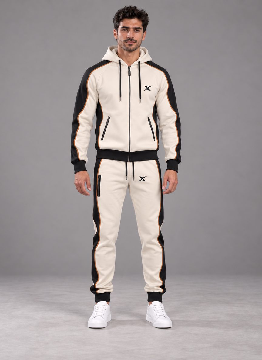 L'ensemble Sweep Zip porté, vu de face, coloris Bronze : veste à capuche zippée et jogger assortis.